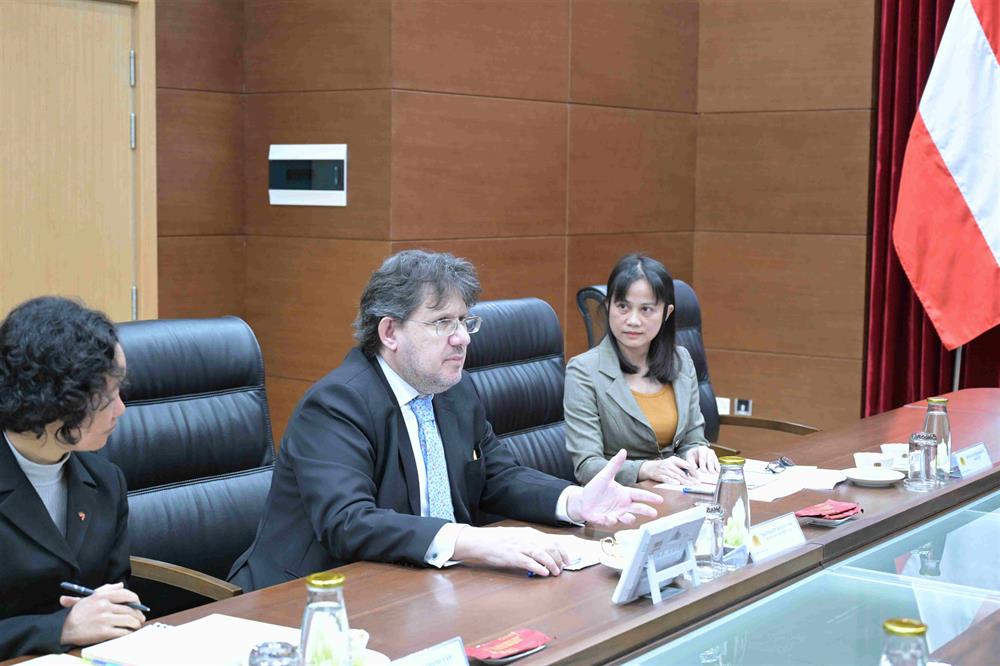 Austrian Ambassador Philipp Agathonos speaks at the meeting.