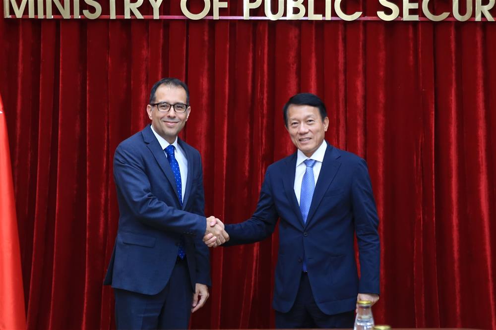 Minister Luong Tam Quang and Ambassador Korhan Kemik.