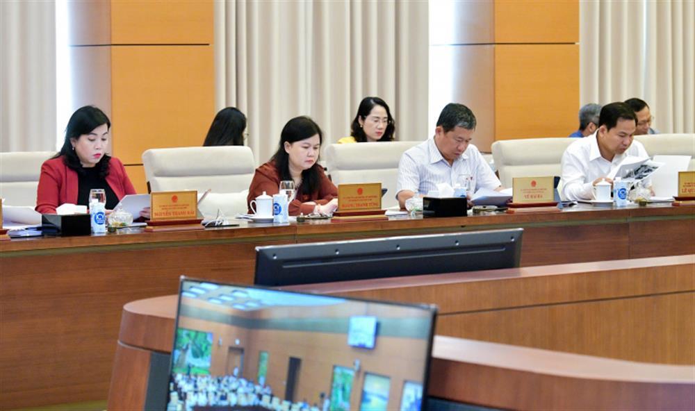 Delegates attend the meeting.