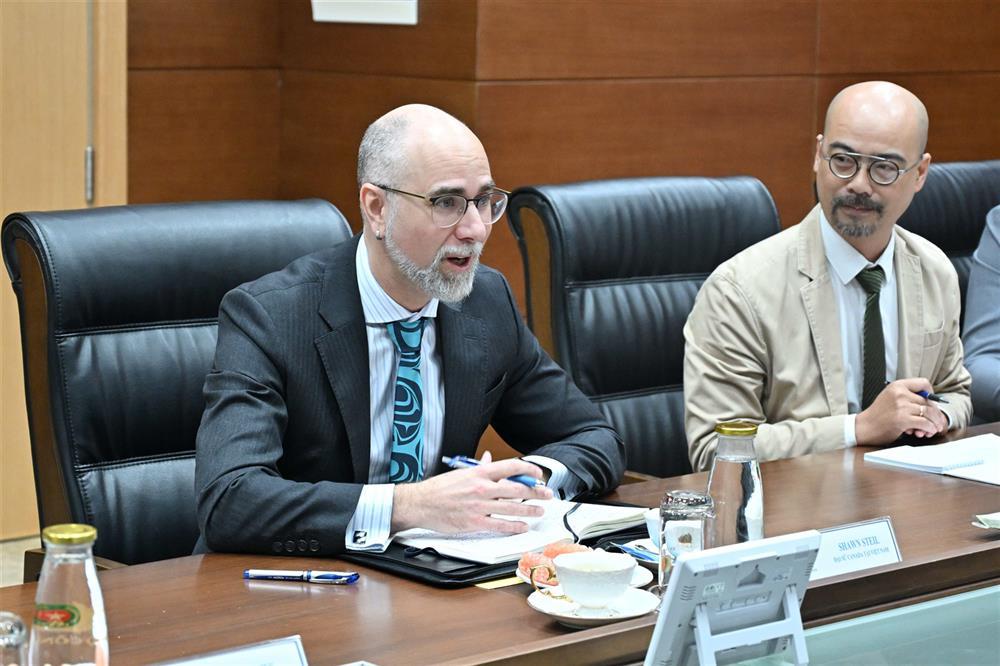 Ambassador Shawn Steil speaks at the meeting.
