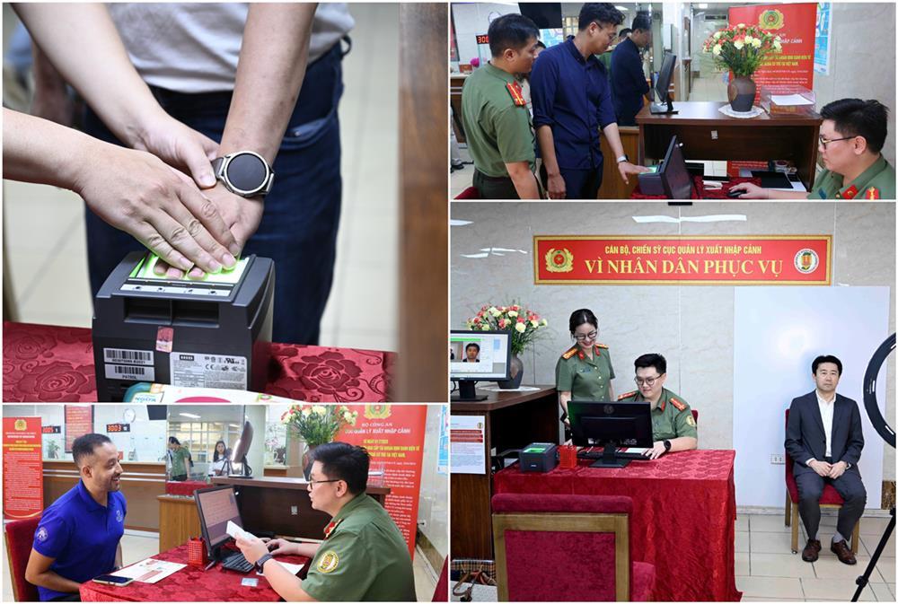 Immigration officers receive foreigners’ application for e-ID accounts.