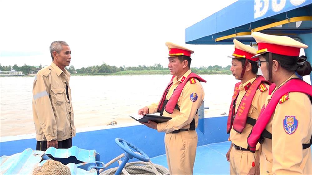 Police inspect waterway vessels.
