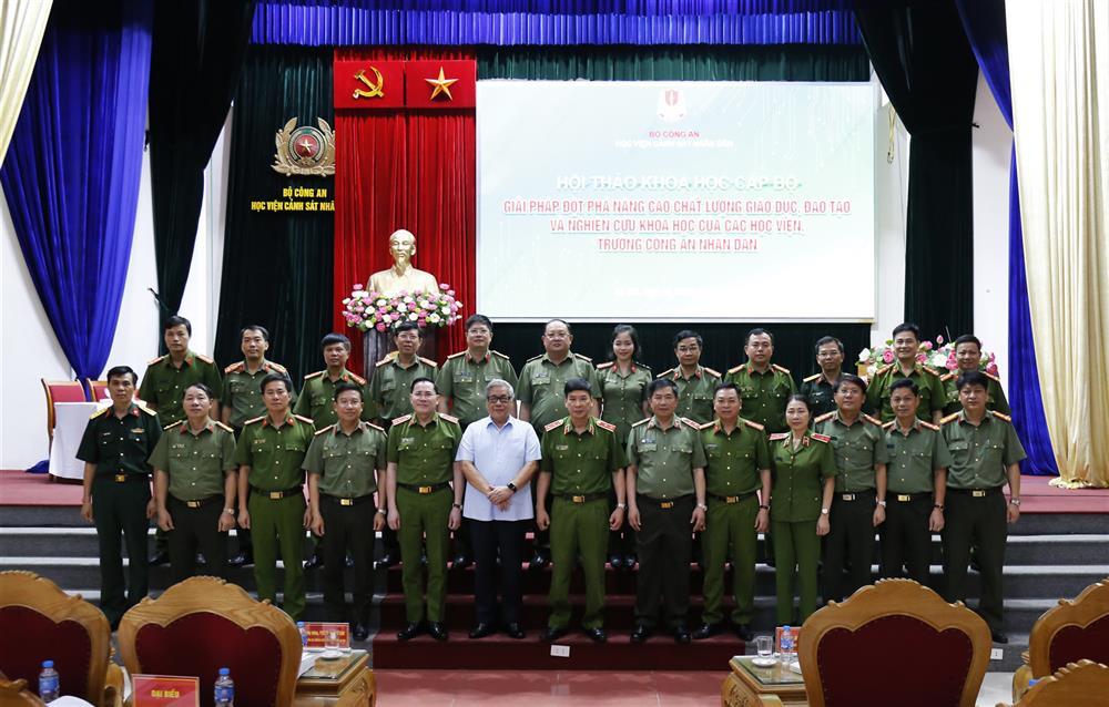 Delegates join in group photo.