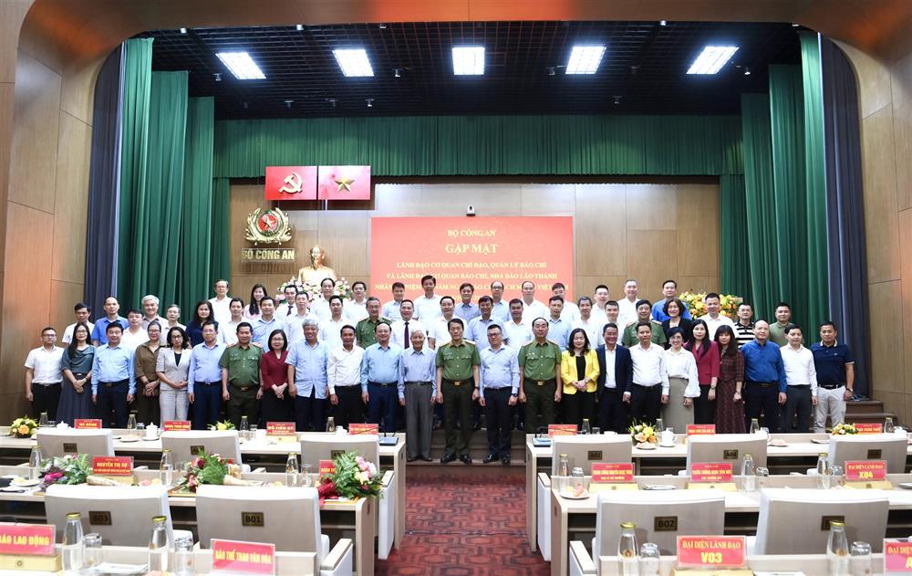 Delegates join group photo.