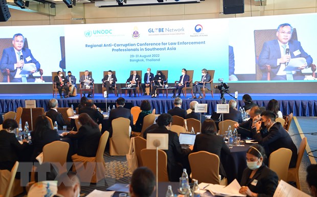 Delegates listened to report from Major General Nguyen Van Long.