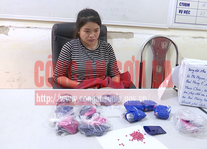 Lo Thi Ngoan and the exhibits at the police station.