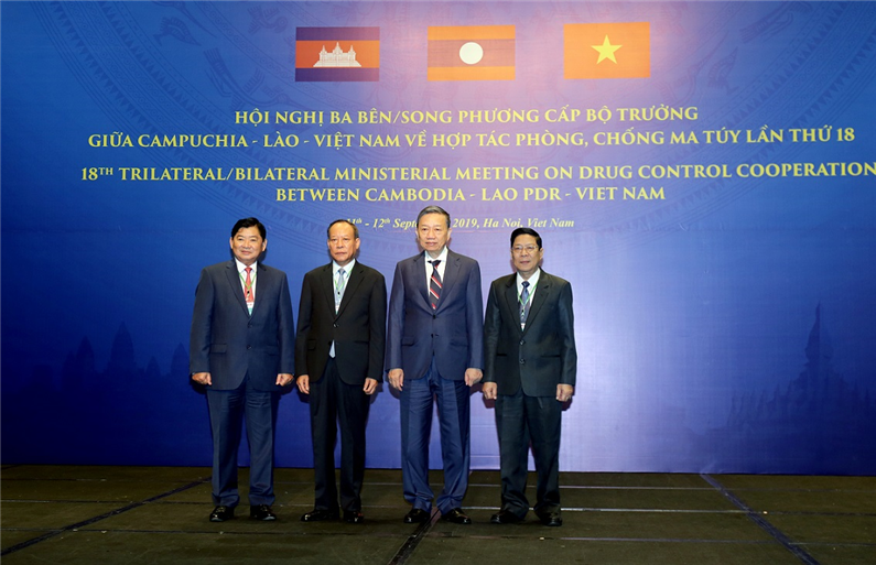 Minister To Lam and representatives of Vietnam, Laos and Cambodia.